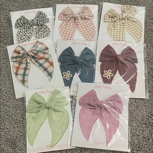 8 oversized bows on clips